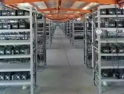 An overhead view of a bustling mining farm, highlighting the efficiency and scale of colocation setups for optimal mining success