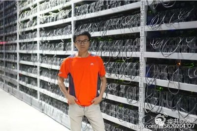 A vast warehouse filled with rows of mining machines, highlighting the scale of a large mining farm.